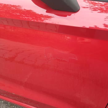 Aydoğanlar Otomotiv (Ankara) İbiza 2021 Model Aracın Sağ Kapısında Avuç İçi Kadar Boya Atması