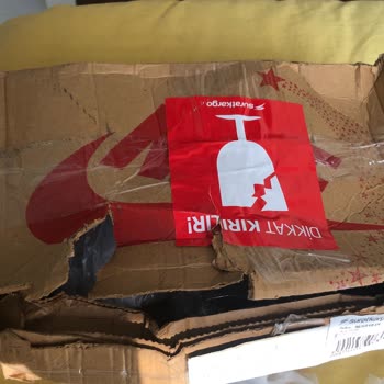 Sürat Kargo Paketim Kenarından Yırtılmış