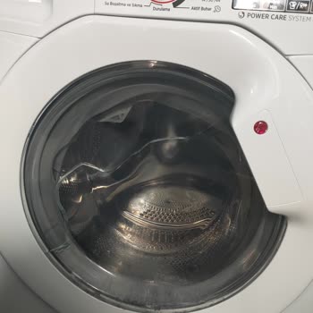 Hoover Kurutmalı Çamaşır Makinesi Kapak Camı Kırıldı.