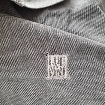 Lufian T-shirtte 3 Farklı Yerde Yırtılmalar.