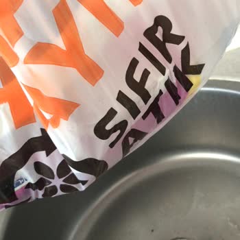 Migros Deterjanın Açık Poşete Konulması