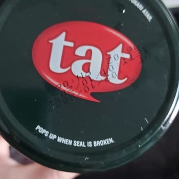 Tat Konserve Kavanozda Cam Parçası