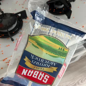 BİM Patlak Gıda Paketini Bantlayarak Satması