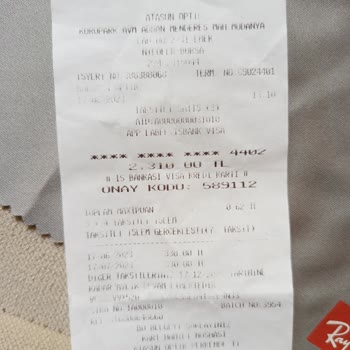 Atasun Optik Güneş Gözlüğü Cam Ve Çerçeve Çizilmesi, Temizlerken Camın Sallanması