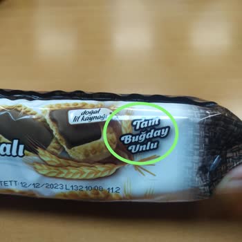 Eti Gıda Eti Burçak Çikolata Kremalı Bisküvi Üzerinde Yazım Hatası Var