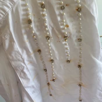 Refka Yıkama Talimatına Göre Taş Kısmı Paslanmış Tunik