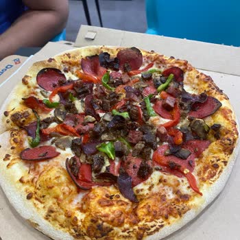 Domino's Pizza Ürünün Üzerinin Yanık Olması