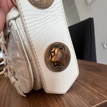 Manc Metalde Kararma Ve Çanta Sapının Yamuk Durması