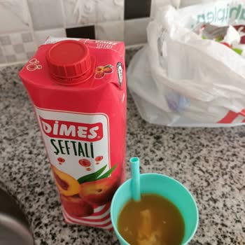 Dimes Gıda Meyve Suyunun İçinden Çıkan Cisim