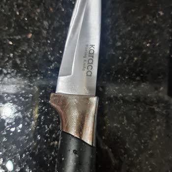 Karaca Züccaciye'ye  Ait Bıçak Sapında Solma Var.