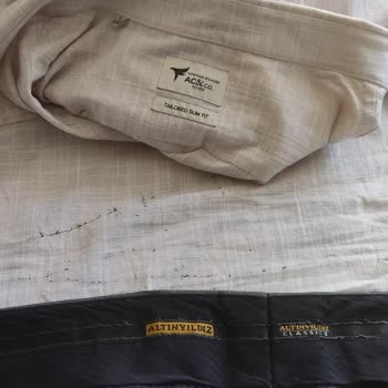 Altınyıldız Pantolonun Bel Kısmındaki Lastiğin Gömleğe Yapışması