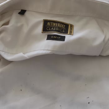 Altınyıldız Pantolonun Bel Kısmındaki Lastiğin Gömleğe Yapışması