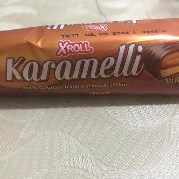 A101 Xroll Marka Sütlü Çikolata Kaplı Karamelli Bisküviden İp Çıktı.
