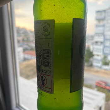 Migros Carlsberg Luna Şişe İçerisinde Beyaz Yabancı Cisimler Ve Bulanıklık