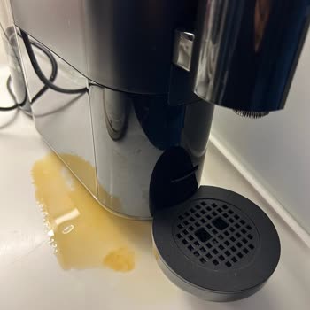 Dripping Nespresso Coffee Machine