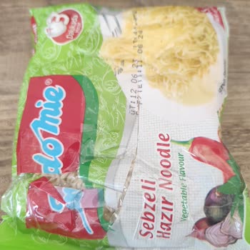 BİM Makarnanın Yırtık Paketi Bantlanmış Durumdaydı