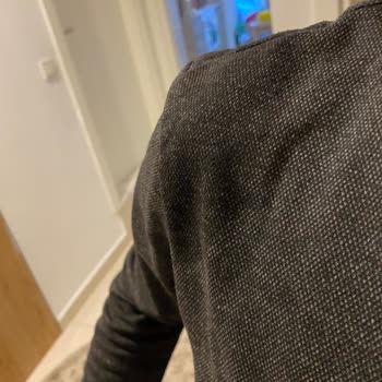 Nike Su Geçirmez Özellikli Yağmurluk Su Aldı