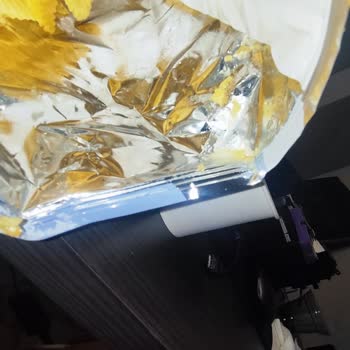 Ruffles Cips Paketinin Açılış Kısmında Yağ Birikintisi