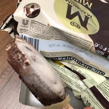 Spoiled Magnum Ice Cream Filled with Ice and Bad Chocolate