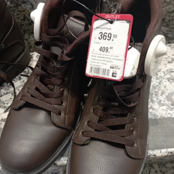 FLO Ayakkabı FLO Kasada Etiket Fiyatının Üzerinde Ürün Satışı Yapıyor