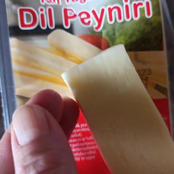 Eker Marka Dil Peynirinin İçi Kıl Dolu