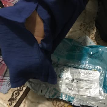 Tofisa'nın Yırtık Ürün Yollaması, Düğmesi Eksik Yollaması