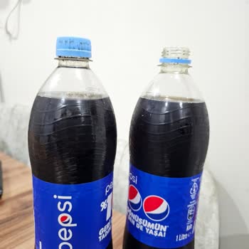 Pepsi Kapak İçinde Siyah Parçalar