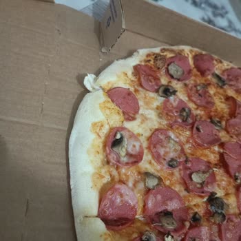 Domino's Pizza Pişmemiş Pizza Gönderilmiş