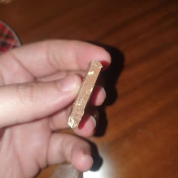 A Strand Of Hair Came Out Of Nestle Chocolate Bar! Nestle Didn't Care!