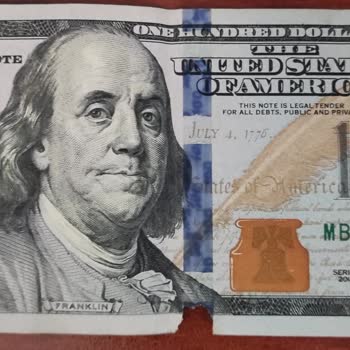 Yapı Kredi Bankası Kendilerinin Verdiği Yırtık Parayı Geri Almıyorlar