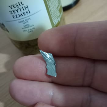 Tariş Zeytinyağı TARİŞ Zeytin Ezmesinden Bıçak Parçası Çıktı.