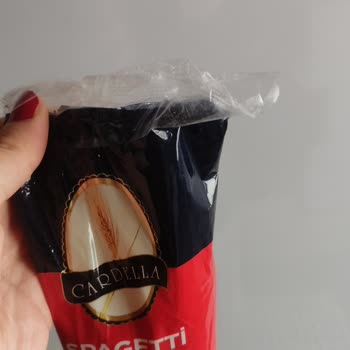 BİM De Açılmış Markanın Ağzı Bantlanarak Satışa Sunulması