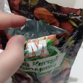 Migros Çiğ Kuruyemiş İçinden Çıkan Parçalar