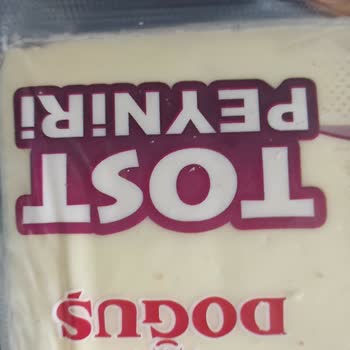 Doğuş Süt Marketten Alınan Tost Peynirinde Plastik Parçası Bulunması