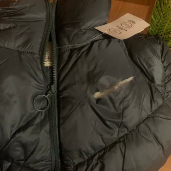 DeFacto Yırtık Mont Gönderdi