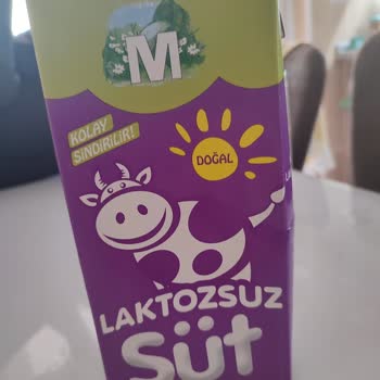 Migros Süt Kutusunun Kapaklarından Sızıntı Olması