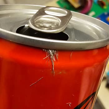 Found Metal Pieces in Coca-Cola Can