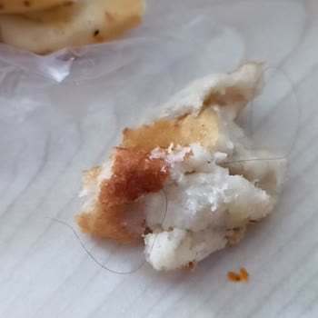 Migros'ta Hijyen Sorunu: Ekmekte Saç Kılı Bulduk!