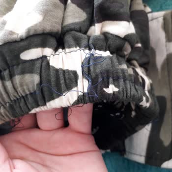 Minicity Kötü Dikiş Yırtık Cep