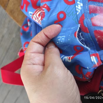 FLO Ayakkabı FLO Ve Lisanlı Çanta Yırtılması