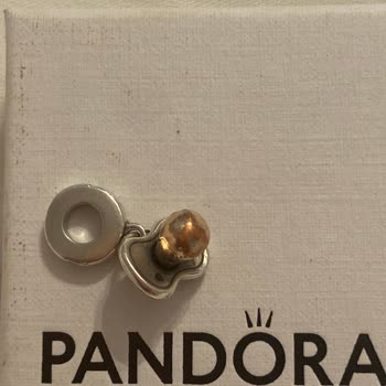 Pandora Mücevher 2 Yıl Garanti Veren Pandora'nın Charm'ı Yılı Dolmadan Karardı