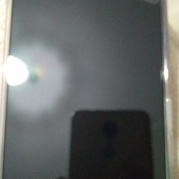 Zore Aksesuar Kayseri Bayi Redmi Not 12 Pro Koruma Camini Defolu Olduğu Halde Takti.