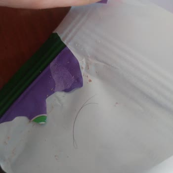 Milka Çikolatanın İç Ambalajında Ki Saç