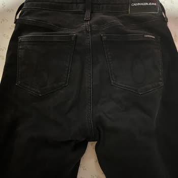Calvin Klein Siyah Pantolon Renk Solması