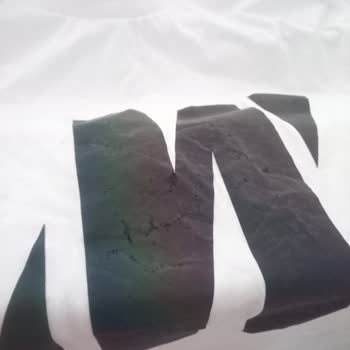 Mavi T-shirt Logo Üzeri Soyulma