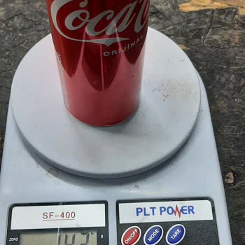 Coca-Cola Yarım Ve Boş Kutu Kola