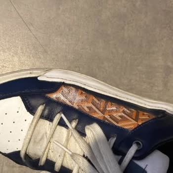 Premature Fading Issue with GUESS Shoes, No Exchange or Refund Provided