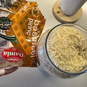 Damla Bakliyat Basmati Pirinç İçerisinden Çıkan İplik Parçası