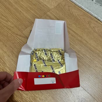 Ülker Çikolata Paketten Açılmamış Şekilde Yarım Çıkması