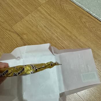 Ülker Çikolata Paketten Açılmamış Şekilde Yarım Çıkması